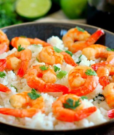 This Honey Garlic Shrimp and Cilantro Lime Rice Bowl is packed with tender shrimp, seasoned with a sweet honey garlic sauce and nestled on top of zesty cilantro lime rice. It's ready in just 20 minutes and bursting with flavor!