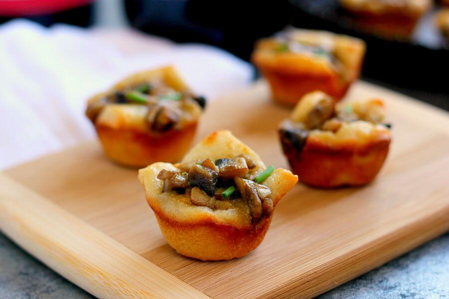 Filled with fresh mushrooms, Parmesan cheese, and a sprinkling of spices, these Parmesan Mushroom Bites are packed with flavor and make the perfect treat for any occasion!