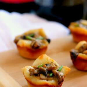 Filled with fresh mushrooms, Parmesan cheese, and a sprinkling of spices, these Parmesan Mushroom Bites are packed with flavor and make the perfect treat for any occasion!