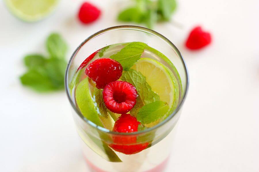 This Raspberry Moscato Mojito is filled with sweet Moscato, fresh raspberries, mint, and a touch of sweetness. This drink provides a unique twist on a classic favorite, with no rum needed!