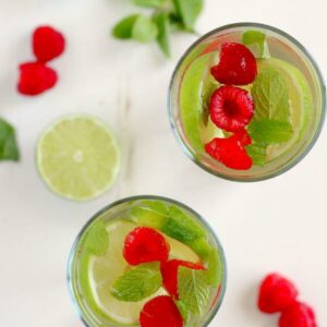 This Raspberry Moscato Mojito is filled with sweet Moscato, fresh raspberries, mint, and a touch of sweetness. This drink provides a unique twist on a classic favorite, with no rum needed!