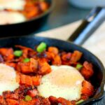 Packed with roasted maple sweet potatoes, fresh eggs, peppers, and bacon, this Roasted Maple Sweet Potato Breakfast Skillet comes together in minutes and makes a hearty breakfast. It's easy to prepare and full of cozy flavors that are perfect on those cool, fall mornings!