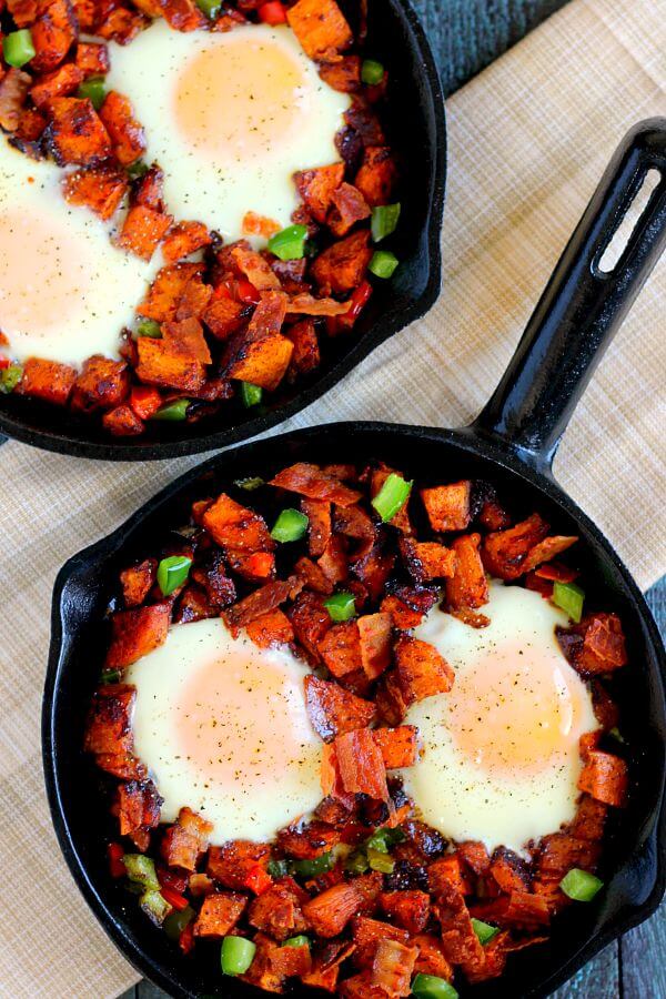 Packed with roasted maple sweet potatoes, fresh eggs, peppers, and bacon, this Roasted Maple Sweet Potato Breakfast Skillet comes together in minutes and makes a hearty breakfast. It's easy to prepare and full of cozy flavors that are perfect on those cool, fall mornings!