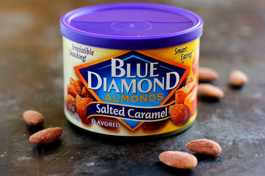 Jam-packed with peanut butter popcorn and filled with Blue Diamond Salted Caramel Almonds, this Salted Caramel Peanut Butter Popcorn is a little sweet, a little salty, and the perfect treat to munch on when your cravings strike!