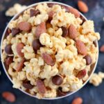 Jam-packed with peanut butter popcorn and filled with Blue Diamond Salted Caramel Almonds, this Salted Caramel Peanut Butter Popcorn is a little sweet, a little salty, and the perfect treat to munch on when your cravings strike!