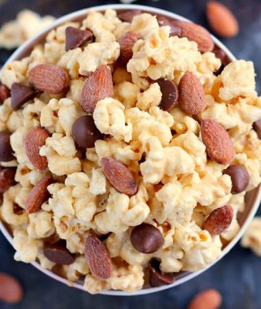 Jam-packed with peanut butter popcorn and filled with Blue Diamond Salted Caramel Almonds, this Salted Caramel Peanut Butter Popcorn is a little sweet, a little salty, and the perfect treat to munch on when your cravings strike!