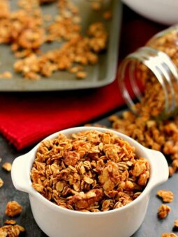 apple pie granola in a white dish