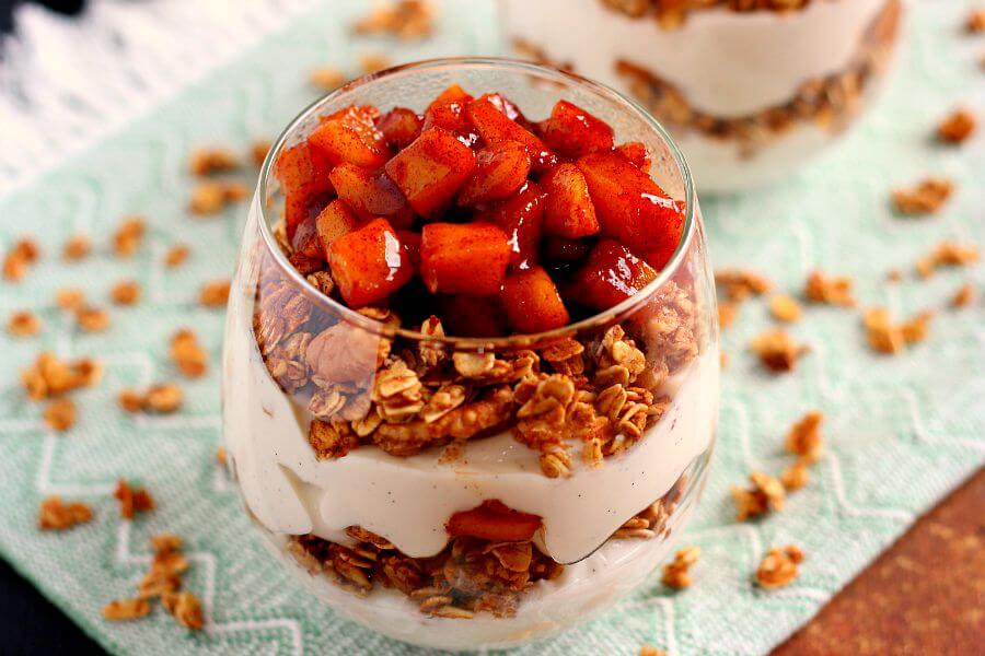 Packed with creamy vanilla yogurt, apple pie granola, and caramelized apples, this Apple Pie Yogurt Parfait is full of protein and fall flavors. It's a great way to spice up your morning breakfast or afternoon snack!