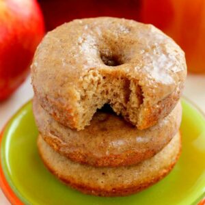These Cinnamon Vanilla Glazed Donuts are baked to perfection with hints of fall spices and sweet apple cider. Covered in a vanilla glaze that's sweetened with cinnamon, these donuts are easy to make and the perfect treat for fall!