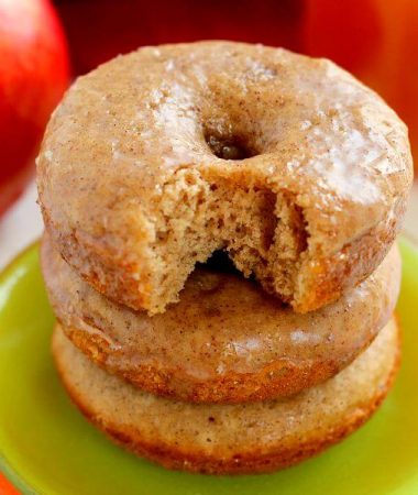 These Cinnamon Vanilla Glazed Donuts are baked to perfection with hints of fall spices and sweet apple cider. Covered in a vanilla glaze that's sweetened with cinnamon, these donuts are easy to make and the perfect treat for fall!