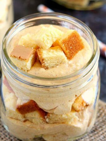 This No-Bake Pumpkin Cheesecake Trifle is filled with a creamy cheesecake batter that's swirled with pumpkin and topped with golden pound cake chunks. It's an easy treat that requires no oven and is perfect to capture the flavors of fall!