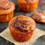 a pumpkin nutella muffin on a piece of burlap