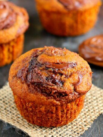 a pumpkin nutella muffin on a piece of burlap