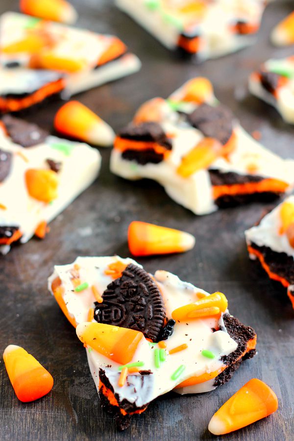 This White Chocolate Boo Bark is is filled with creamy white chocolate, Oreo cookies, and chewy candy corn. It's so easy to make and is the perfect snack to munch on during Halloween!
