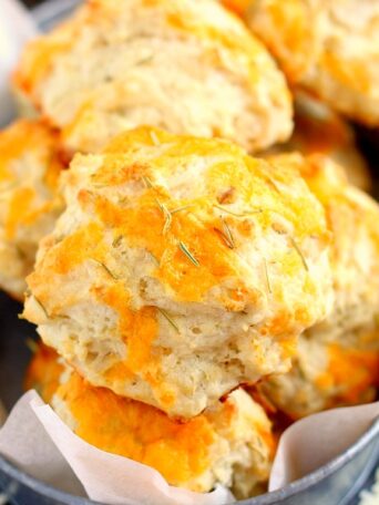 These Cheddar Rosemary Biscuits are soft, flaky, and bursting with flavor. The fresh cheddar cheese and rosemary gives these biscuits the perfect amount of zest. And best of all, it's ready in less than 20 minutes!