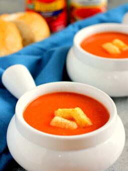 This Creamy Tomato Soup is filled with zesty tomatoes, seasoned with spices, and is ready in just 20 minutes. It makes the perfect, lighter soup for enjoying on chilly, fall nights. Once you try this version, you'll never go back to the canned kind!