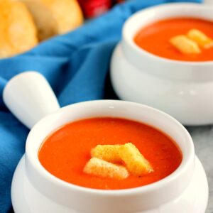 This Creamy Tomato Soup is filled with zesty tomatoes, seasoned with spices, and is ready in just 20 minutes. It makes the perfect, lighter soup for enjoying on chilly, fall nights. Once you try this version, you'll never go back to the canned kind!