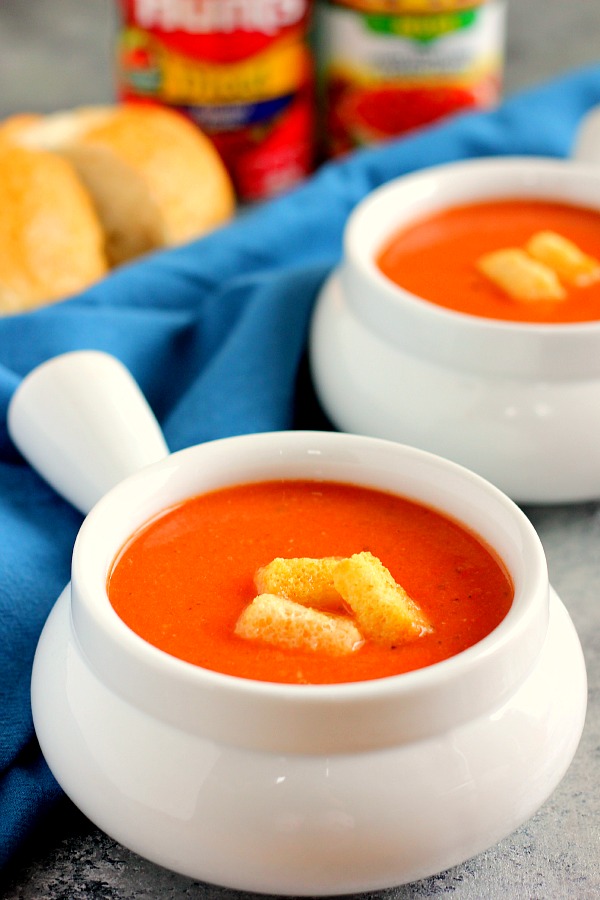 This Creamy Tomato Soup is filled with zesty tomatoes, seasoned with spices, and is ready in just 20 minutes. It makes the perfect, lighter soup for enjoying on chilly, fall nights. Once you try this version, you'll never go back to the canned kind!