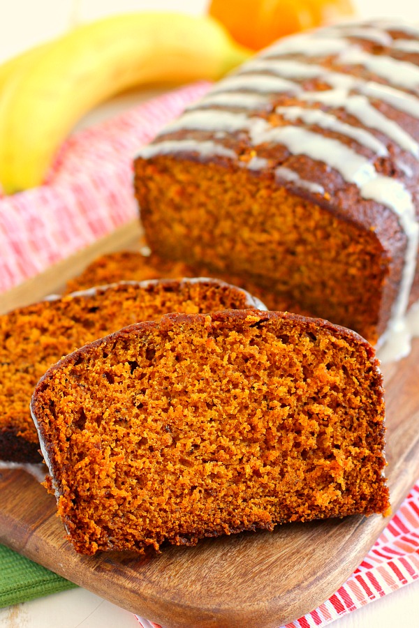 This Honey Glazed Pumpkin Banana Bread combines the classic fall flavor of pumpkin, swirled with hints of banana, and then topped with a sweet honey glaze. This bread is soft, moist, and bursting with just the right amount of flavor. One bite and this is sure to be your new fall favorite! #bananabread #bananabreadrecipe #pumpkinbread #pumpkinbananabread #falldesserts #fallbreakfastideas #fallbreakfasts #recipe