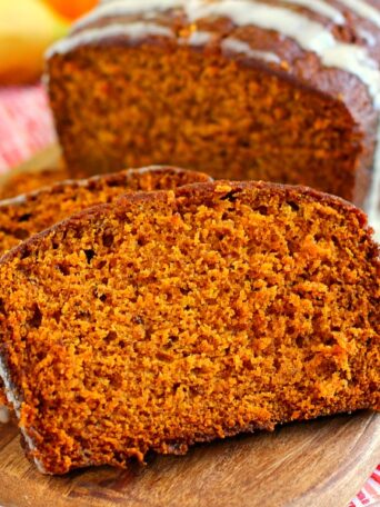 This Honey Glazed Pumpkin Banana Bread combines the classic fall flavor of pumpkin, swirled with hints of banana, and then topped with a sweet honey glaze. This bread soft, moist, and bursting with just the right amount of flavor. One bite and this is sure to be your new fall favorite!