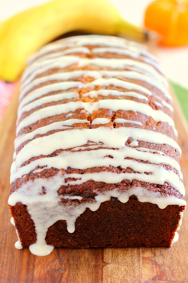 This Honey Glazed Pumpkin Banana Bread combines the classic fall flavor of pumpkin, swirled with hints of banana, and then topped with a sweet honey glaze. This bread is soft, moist, and bursting with just the right amount of flavor. One bite and this is sure to be your new fall favorite! #bananabread #bananabreadrecipe #pumpkinbread #pumpkinbananabread #falldesserts #fallbreakfastideas #fallbreakfasts #recipe