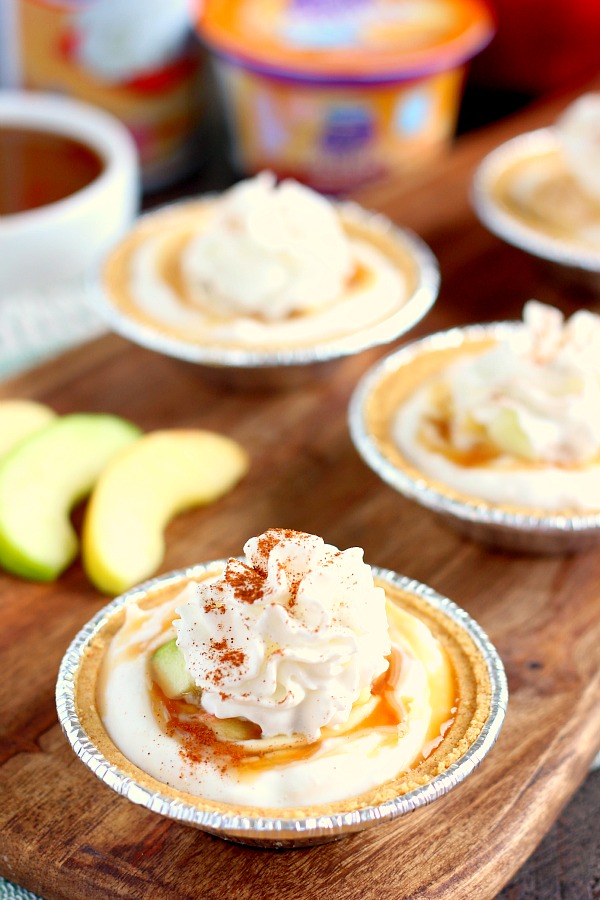 With just a few simple ingredients, these Mini Caramel Apple Yogurt Pies come together in no time and serve as a healthier treat. Filled with Dannon® Greek Yogurt Oikos® Light & Fit® Caramel Apple Pie Yogurt, fresh apple chunks, and a cinnamon swirl, these pies make the perfect fall dessert!