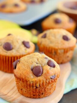 These Banana Chocolate Chip Muffins are jam-packed with sweet bananas and dark chocolate chips. The Greek yogurt keeps these muffins on the lighter side, while packing a punch of protein, which makes these muffins soft, moist, and flavorful!