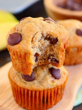 These Banana Chocolate Chip Muffins are jam-packed with sweet bananas and dark chocolate chips. The Greek yogurt keeps these muffins on the lighter side, while packing a punch of protein, which makes these muffins soft, moist, and flavorful!