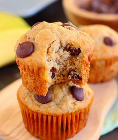 These Banana Chocolate Chip Muffins are jam-packed with sweet bananas and dark chocolate chips. The Greek yogurt keeps these muffins on the lighter side, while packing a punch of protein, which makes these muffins soft, moist, and flavorful!