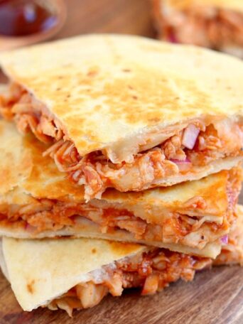 This BBQ Chicken Quesadilla is packed with tender chicken, tangy barbecue sauce, red onions, and mozzarella cheese. It makes the perfect weeknight meal and is ready in just 15 minutes!