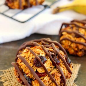Jam-packed with hearty oats, bananas, dried cherries and chocolate chips, these Chocolate Cherry Banana Breakfast cookies are a healthy, one-bowl treat. They bake up crispy on the outside, soft on the inside and are full of healthy ingredients. If you love eating dessert for breakfast, then these cookies were made for you!
