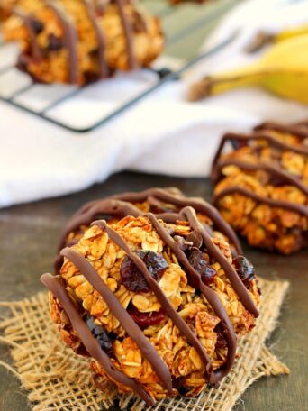 Jam-packed with hearty oats, bananas, dried cherries and chocolate chips, these Chocolate Cherry Banana Breakfast cookies are a healthy, one-bowl treat. They bake up crispy on the outside, soft on the inside and are full of healthy ingredients. If you love eating dessert for breakfast, then these cookies were made for you!