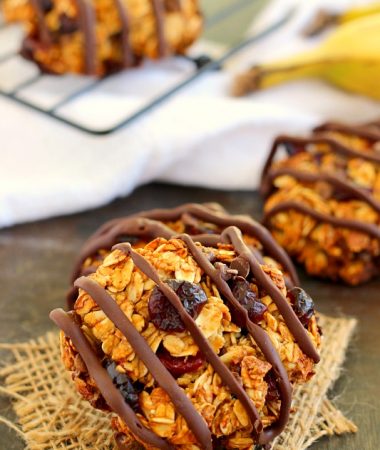 Jam-packed with hearty oats, bananas, dried cherries and chocolate chips, these Chocolate Cherry Banana Breakfast cookies are a healthy, one-bowl treat. They bake up crispy on the outside, soft on the inside and are full of healthy ingredients. If you love eating dessert for breakfast, then these cookies were made for you!