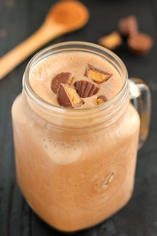 a chocolate peanut butter smoothie in a glass jar 