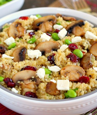This Cranberry, Edamame and Mushroom Quinoa Bowl is packed with nutritious ingredients to make a healthy and satisfying meal. The tart cranberries, steamed edamame, mushrooms and feta make a delicious dish that easy to prepare and ready in no time!