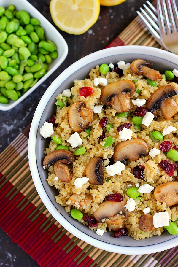 This Cranberry, Edamame and Mushroom Quinoa Bowl is packed with nutritious ingredients to make a healthy and satisfying meal. The tart cranberries, steamed edamame, mushrooms and feta make a delicious dish that easy to prepare and ready in no time! #quinoa #quinoabowl #mushrooms #cranberries #mushroomquinoabowl #healthybowl #healthyrecipe #lunch #dinner