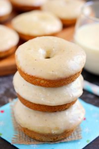 stack of eggnog donuts with glaze