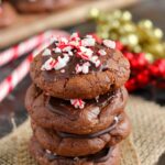 These Peppermint Hot Chocolate Cookies bake up soft, thick and taste just like hot chocolate. The tops are frosted with mint chocolate and then topped with crushed candy canes. These cookies are perfect to enjoy all season long!