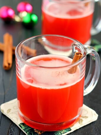 This Spiced Cherry Cider is filled with sweet apple cider and spiced with cinnamon and cherry gelatin. It's simmered until the flavors are blended together and makes the perfect drink for when you need a little warming up!