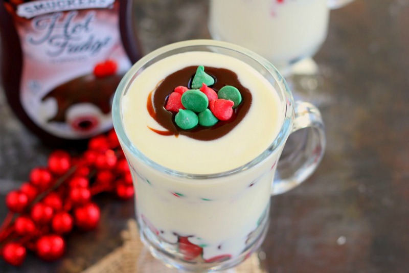 This White Chocolate Fudge Pudding is creamy, rich, and bursting with flavor. White chocolate pudding is layered with hot fudge and festive chocolate chips. It's easy to make and so much better than the store-bought kind. If you're looking for a new dessert for the holiday season, then this pudding is guaranteed to be a favorite!