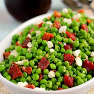 These Bacon and Feta Peas are seasoned with a buttery garlic sauced and packed with crumbled bacon and creamy feta cheese. It’s an easy side dish that takes just minutes to make and is sure to be a favorite in your household!