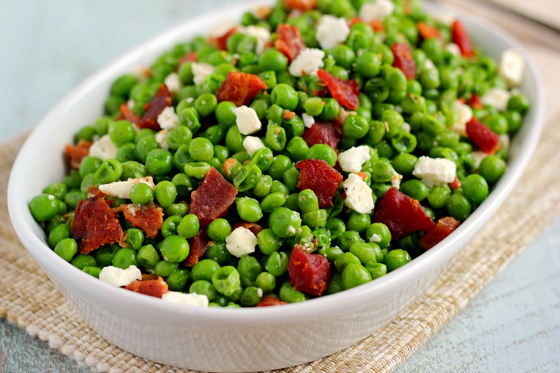 These Bacon and Feta Peas are seasoned with a buttery garlic sauced and packed with crumbled bacon and creamy feta cheese. It’s an easy side dish that takes just minutes to make and is sure to be a favorite in your household!