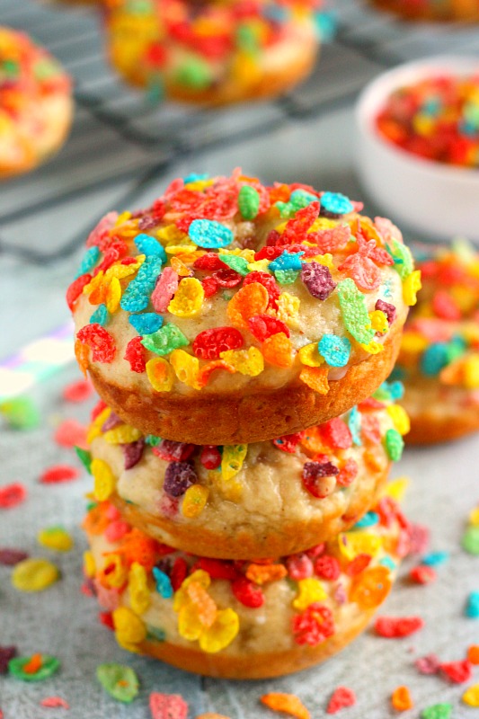 These Baked Fruity Pebble Donuts feature a fluffy vanilla batter, packed with sweet Fruity Pebbles. The donuts are baked and then topped with a rich, vanilla glaze. Healthier than the fried kind and so delicious, these treats will bring out the kid inside of you!