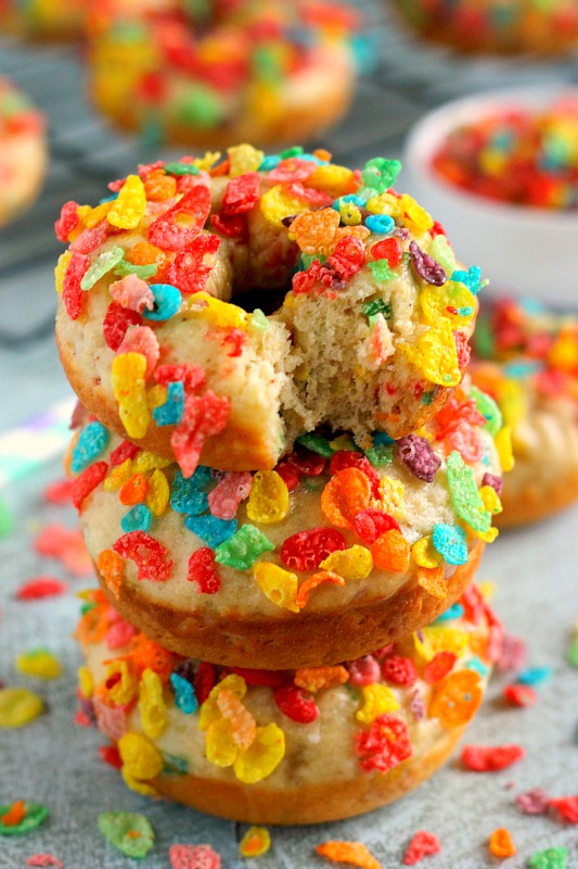 These Baked Fruity Pebble Donuts feature a fluffy vanilla batter, packed with sweet Fruity Pebbles. The donuts are baked and then topped with a rich, vanilla glaze. Healthier than the fried kind and so delicious, these treats will bring out the kid inside of you!