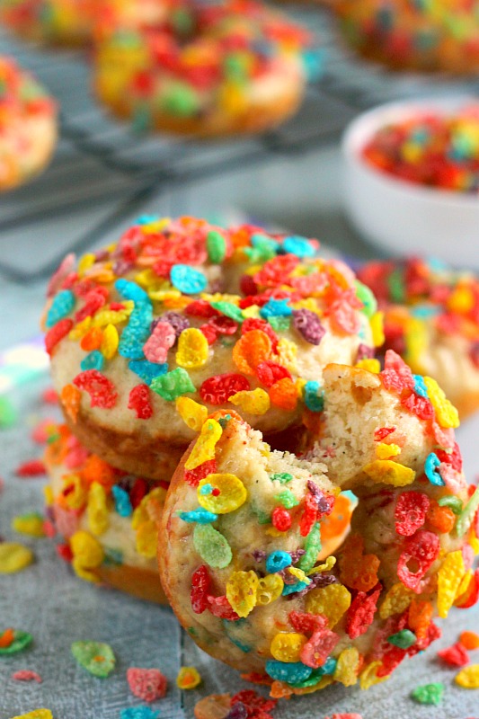 These Baked Fruity Pebble Donuts feature a fluffy vanilla batter, packed with sweet Fruity Pebbles. The donuts are baked and then topped with a rich, vanilla glaze. Healthier than the fried kind and so delicious, these treats will bring out the kid inside of you!