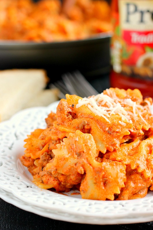 a serving of skillet lasagna on a white plate 