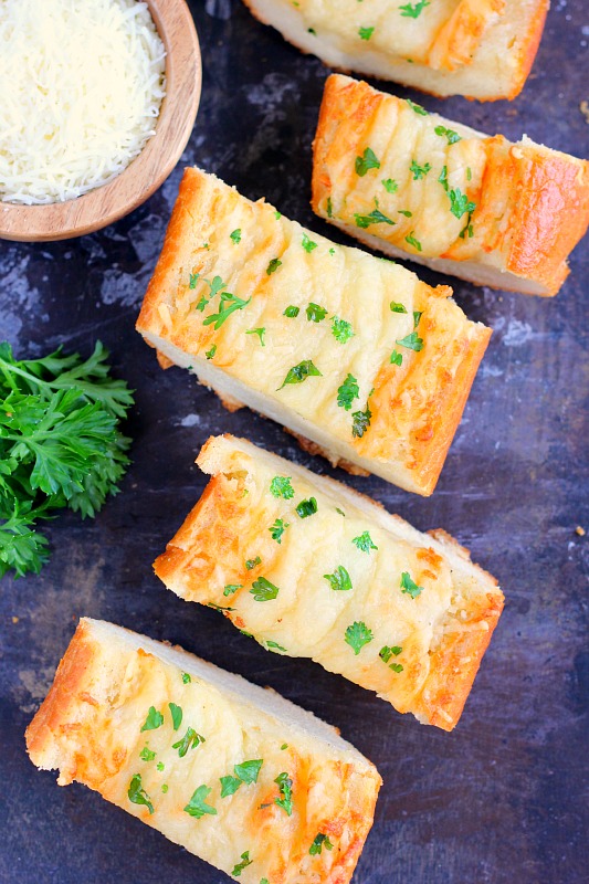 overhead view of slices of garlic cheese bread 