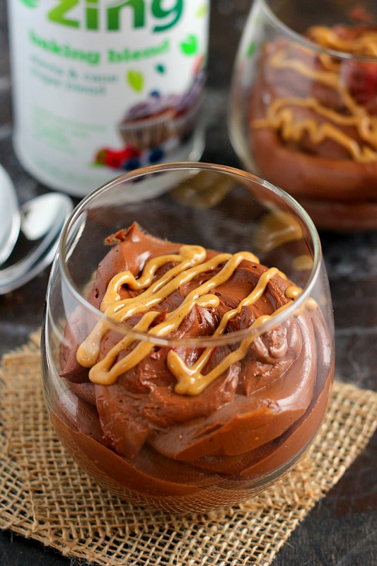 This Chocolate Peanut Butter Cheesecake Mousse is the perfect lightened up dessert. With just five ingredients and minimal prep work, this easy mousse is a delicious, low calorie dessert! #mousse #chocolatemousse #cheesecake #cheesecakemousse #dessert #chocolatedessert #chocolatecheesecake