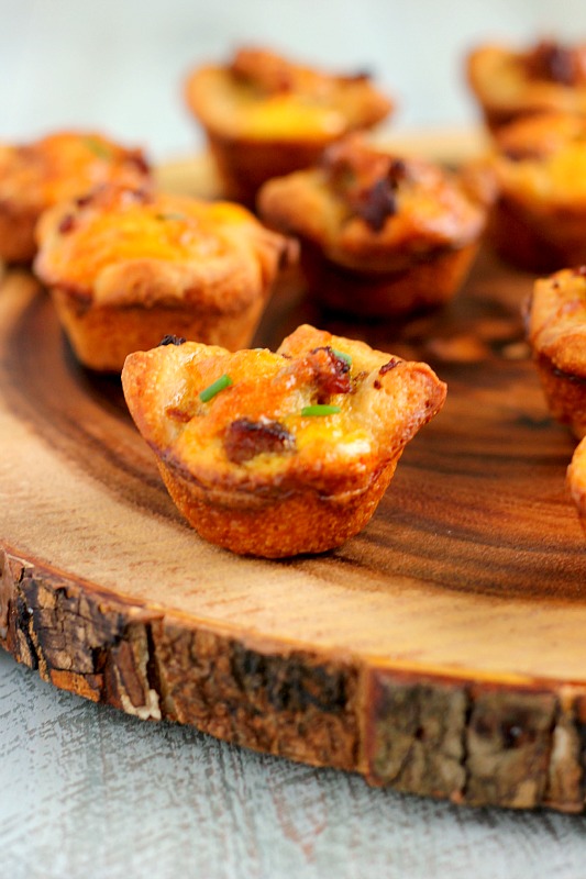 These Mini Sausage Quiches make a delicious, savory dish for your next breakfast or brunch. Filled with zesty sausage, mozzarella cheese and eggs, this recipe is perfect to satisfy your breakfast cravings!