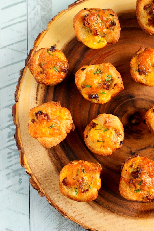 These Mini Sausage Quiches make a delicious, savory dish for your next breakfast or brunch. Filled with zesty sausage, mozzarella cheese and eggs, this recipe is perfect to satisfy your breakfast cravings!